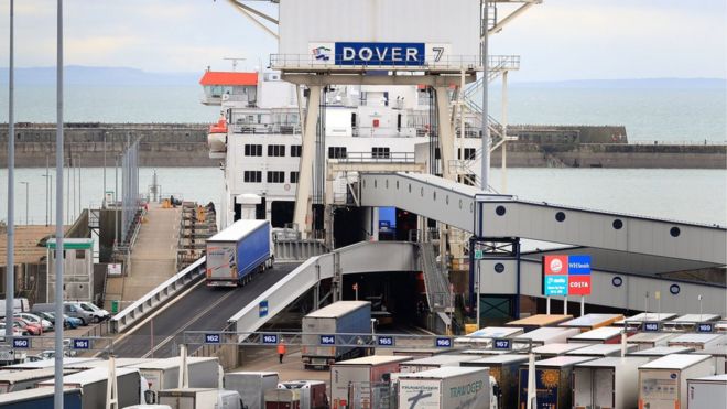 A lorry boards a cross channel ferry at the Port of Dover in Kent
