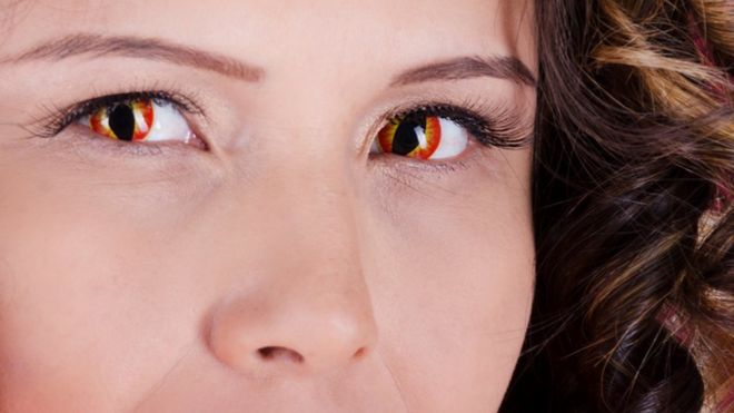 Woman wearing snake eye contact lenses