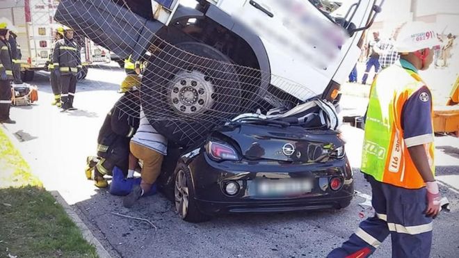 Image result for Woman survives after lorry lands on her car in South Africa