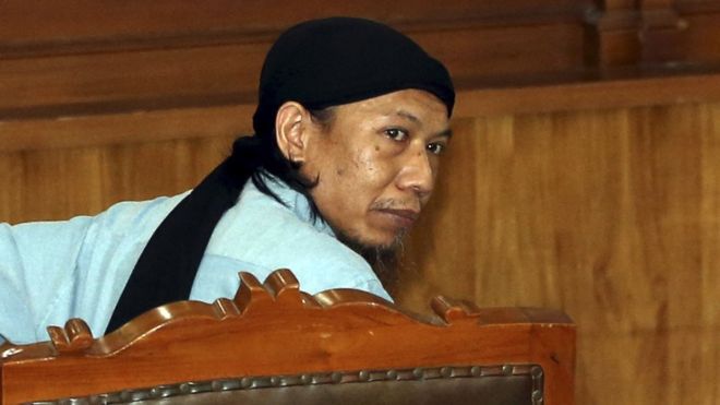 Indonesian terrorist suspect Aman Abdurrahman, alias Oman Rohman, looks on during his trial in Jakarta, Indonesia, 22 June 2018