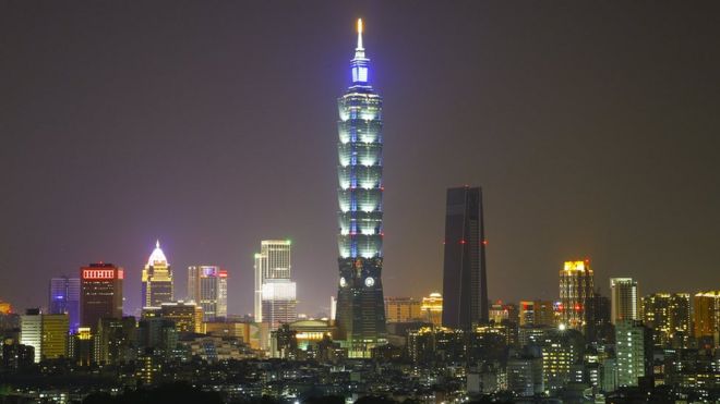 A view of the skyscaper Taipei 101 with lights-on before the Earth Hour in Taipei, Taiwan