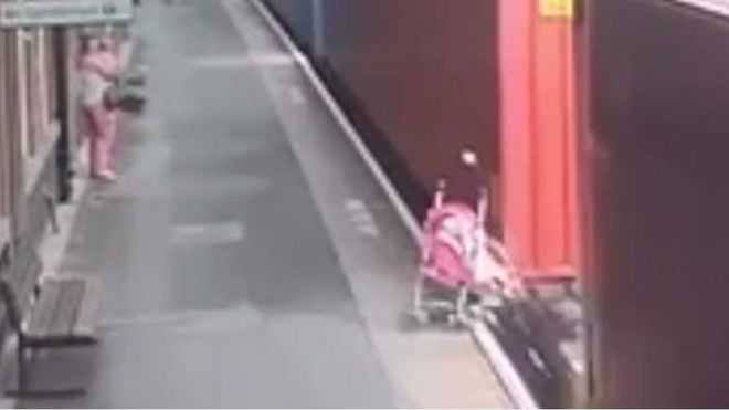 CCTV image of empty buggy dragged under train