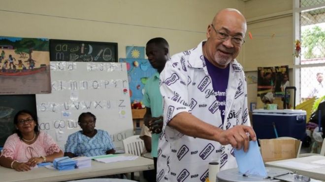 Suriname's President Desi Bouterse of the ruling National Democratic Party casts his vote during parliamentary elections, in Paramaribo, Suriname, May 25, 2020.