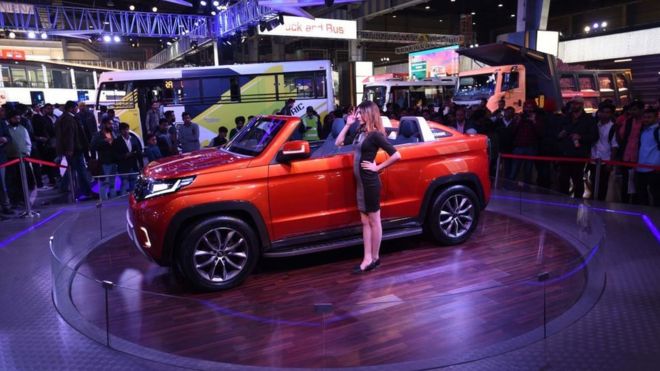 Car and model at annual India motor show