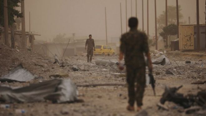 Fighters from the Syrian Democratic Forces in Raqqa. Photo: June 2017