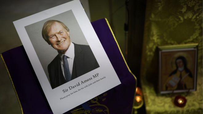 An image of Sir David Amess, displayed at the mass said for him on the day of his death