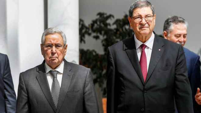 Г-н Бенсала (l) во время своего недавнего визита в Тунис на саммит арабских стран