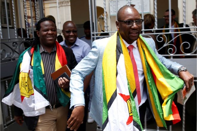 Pastor Evan Mawarire leaves court in Harare, 29 November