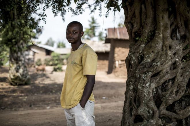 Портрет Джастина, имя которого было изменено для защиты, журналист из Манджины, ДРК