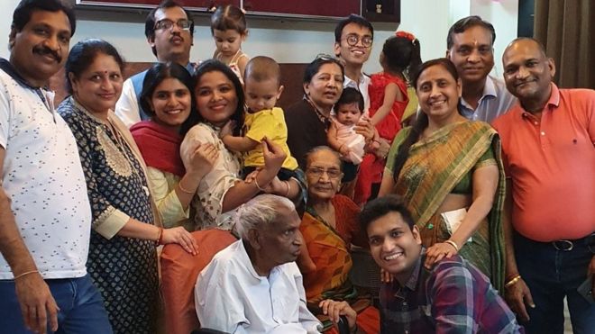 All 17 members of the Garg household