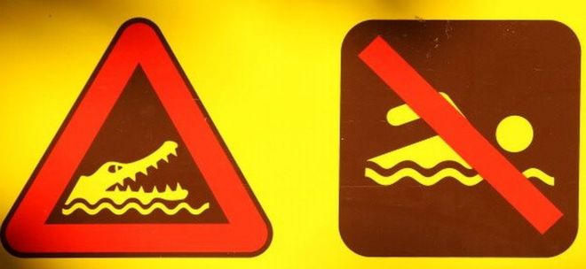 Предупреждающий знак крокодила в Австралии (изображение в файле)