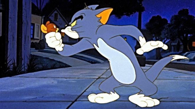 Still showing Tom hold Jerry in his fist in 1992 movie