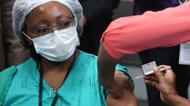 Hospital staff Dr Onicca Khobo-Mpe receives the COVID-19 vaccine at Steve Biko Hospital at the commencement of the vaccination programme on February 17, 2021 in Johannesburg, South Africa. It is reported that the first vaccinations will be given to health workers as part of the national vaccination programme.