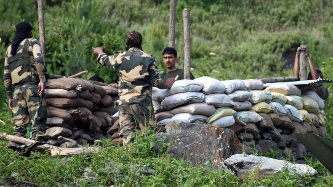 Indian soldiers erect a military bunker along the Srinagar-Leh National highway on 16 June