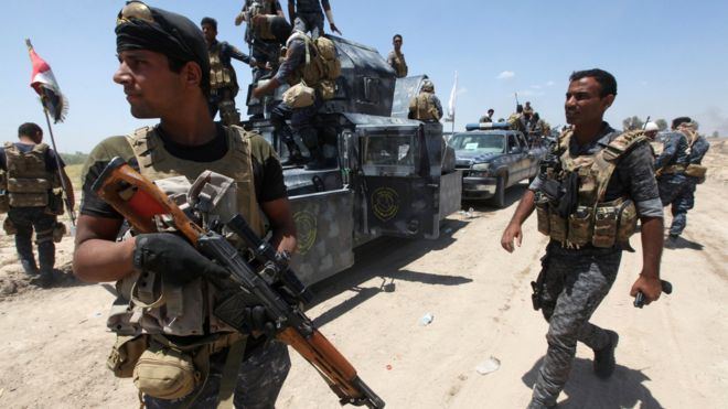 Iraqi security forces gather near Falluja, Iraq, May 31, 2016