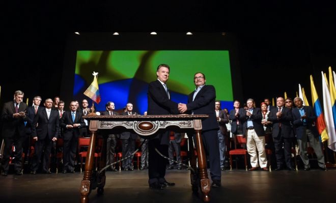Presidente de Colombia Juan Manuel Santos y el líder de las FARC, Timochenko