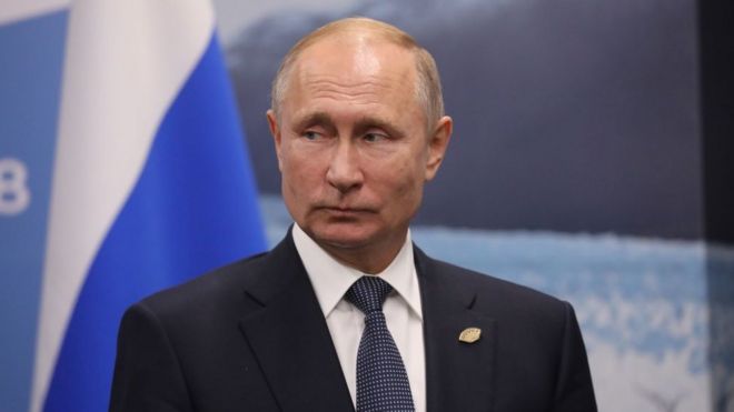 путін