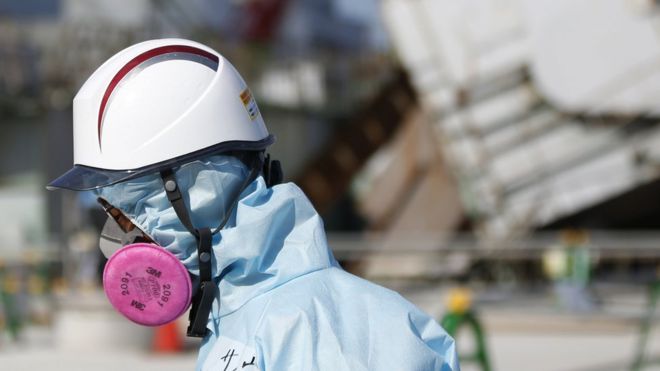 A worker at the Fukushima Daiichi power plant