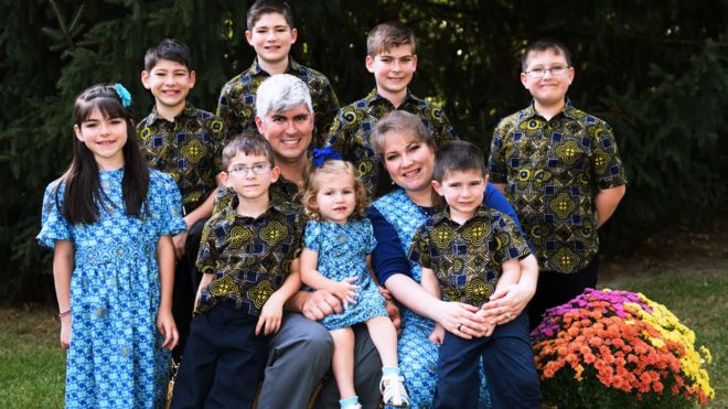 Charles Wesco pictured with his wife and eight children