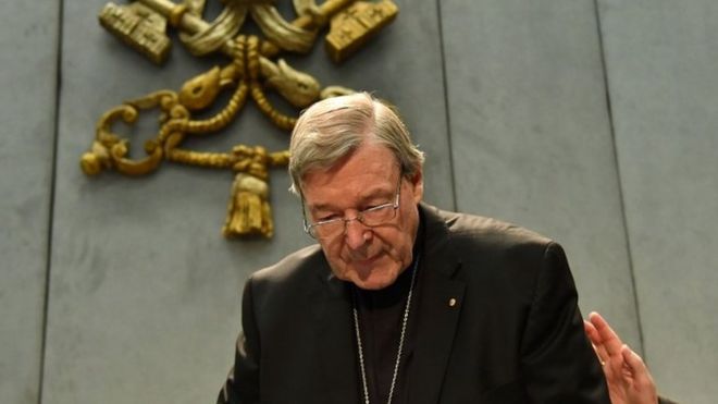 Australian Cardinal George Pell looks on as he makes a statement at the Holy See Press Office, Vatican city on June 29, 2017