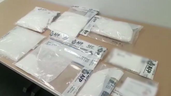 Некоторые из изъятых наркотиков в мешках с надписью полиции