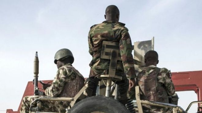 Nigerian soldiers with weapon