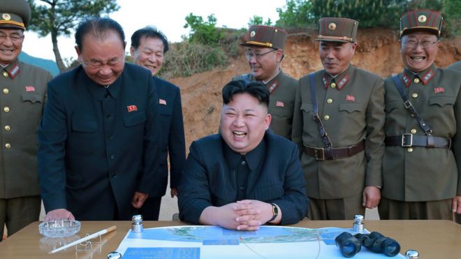 North Korean leader Kim Jong-un reacts during test launch in undated photo released by North Korea's Korean Central News Agency on May 15, 2017