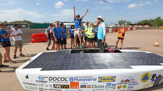 Team members congratulate the driver after Solveig, the car from Sweden's JUsolarteam team, passes testing in Darwin. Photo: 6 October 2017