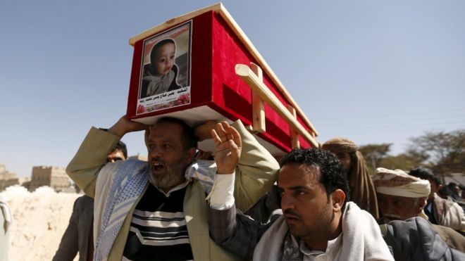 People carry the coffin of a grandson of judge Yahya Rubaid, who was killed with his family by a Saudi-led air strike, in Yemen"s capital Sanaa