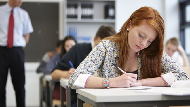 GCSEs and A-level exams in 2022 will be graded more generously - BBC News