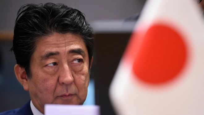 Japan's Prime Minister Shinzo Abe looks on ahead of a Asia Europe Meeting (ASEM) at the European Council in Brussels on October 19, 2018.