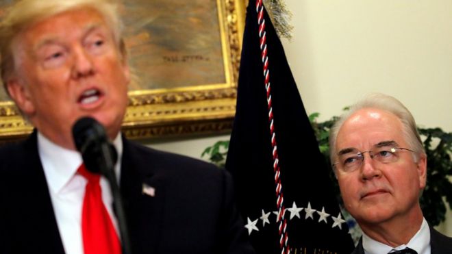 Tom Price (R) looks at Donald Trump during a "Made in America" event at the Roosevelt Room of the White House in Washington, July 20, 2017