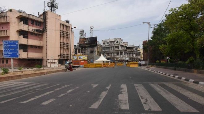 An empty stretch of the road and Delhi Police barricades to screen commuters during lockdown, at Delhi Gate on April 16, 2020 in New Delhi, India.
