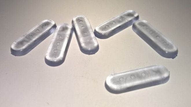 plastic pills with four barcode indentations
