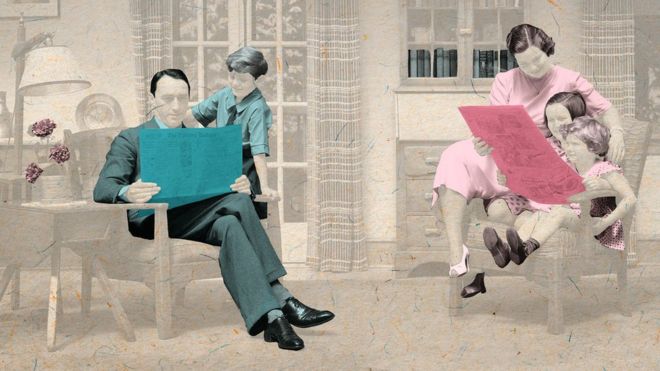 A father reads a newspaper to his son, a mother to her daughters.