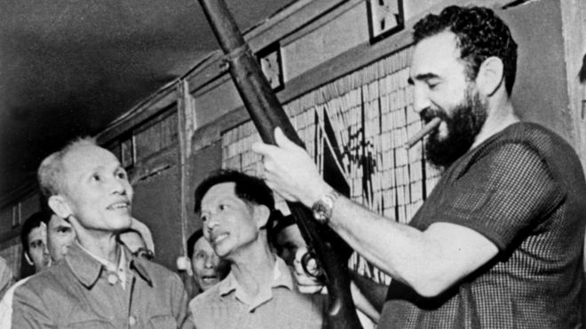 September 1973 shows Cuban president Fidel Castro (R) looking at a rifle during a visit in North Vietnam