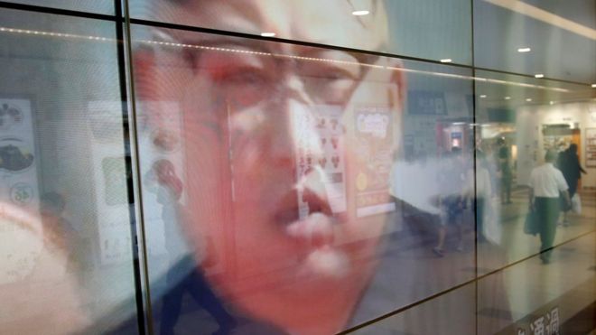 An image of North Korean leader Kim Jong-un on a TV screen in Tokyo, 15 September