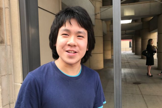 Amos Yee, 18, stands outside the United States Citizenship and Immigration Services offices after his release from detention in Chicago, Illinois, US, 26 September 2017.