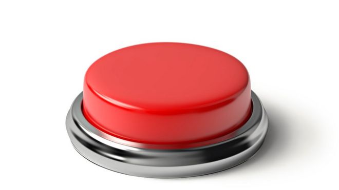 Red button isolated on white - Stock image