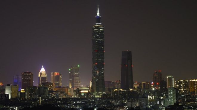 A view of the skyscaper Taipei 101 with lights-off during the Earth Hour in Taipei, Taiwan