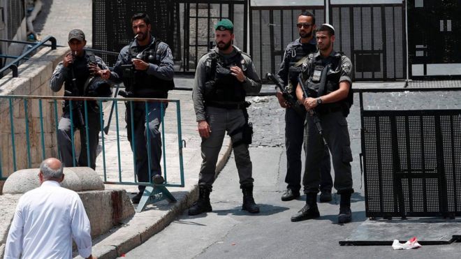 Israeli security forces stand guard outside Lions" Gate, a main entrance to the Al-Aqsa mosque compound in Jerusalem"s Old City, on July 22, 2017.