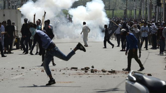 Protesters clash with security forces at the funeral of Kaiser Bhat - 2 June