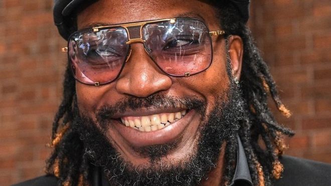 Chris Gayle smiles after winning the case