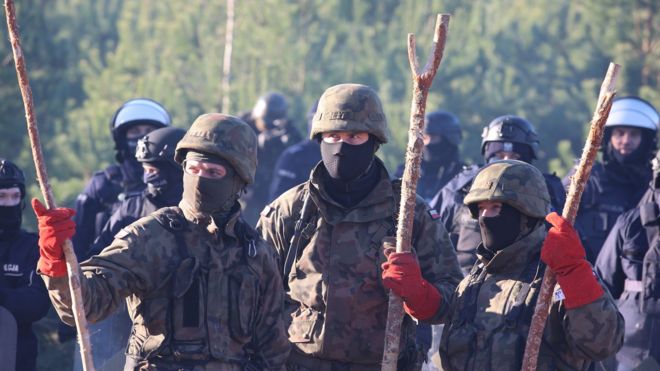 Polish servicemen guarding the border line