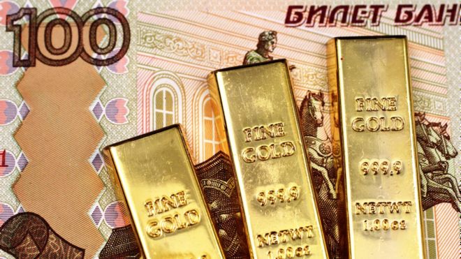 ورقة نقدية فئة مئة روبل مع ثلاث سبائك ذهبية