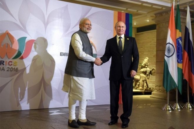 Russian President Vladimir Putin (R) shakes hands with Indian Prime Minister Narendra Modi (L) prior to a meeting of BRICS leaders and heads of delegations of the Bay of Bengal Initiative for Multi-Sectoral Technical and Economic Cooperation (BIMSTEC) member states at Leela Goa hotel in Goa, India, 16 October 2016.