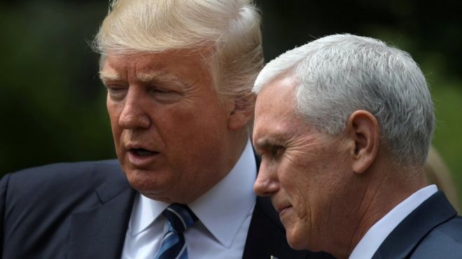 US President Donald Trump and Vice President Mike Pence at the Rose Garden of the White House in Washington