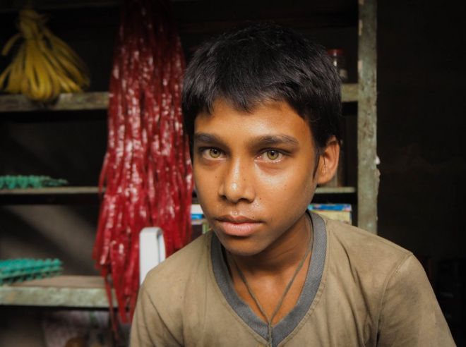 Bangladesh, 2014. A boy poses for a portrait.