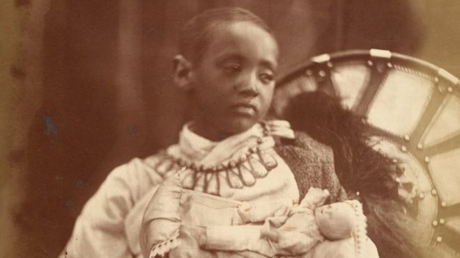 Prince Alemayehu holding a doll