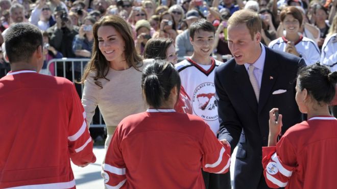The Duke and Duchess of Cambridge shake hands with ice hockey players during their tour of Canada
